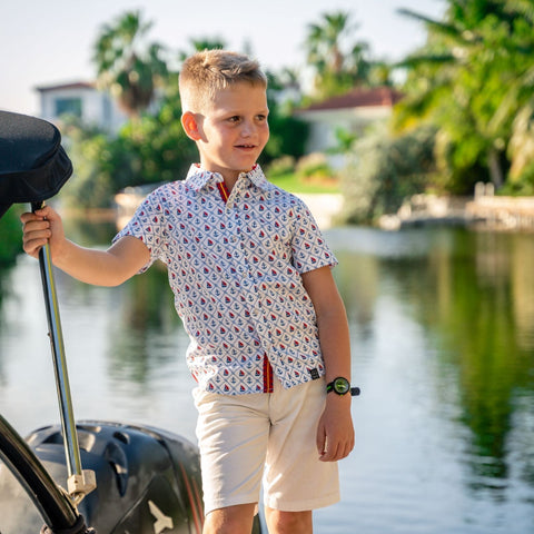 TukTuk Designs Anchors Aweigh short sleeve shirt featuring nautical sailboats and anchors with collar and placket detail all in 100% cotton. Matching sibling dresses available too!