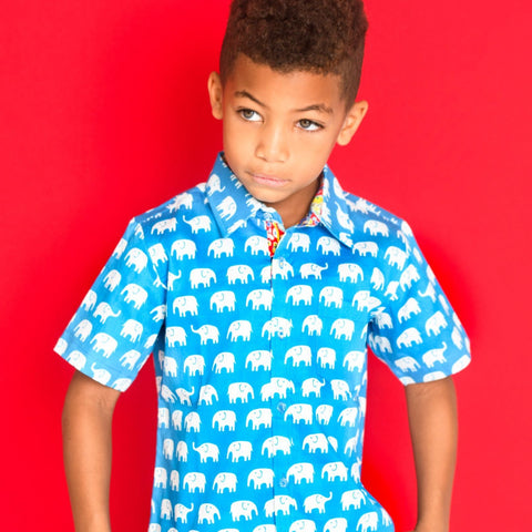 TukTuk Designs Boys short sleeve tailored, button up shirt in bright blue elephant print with colorful paisley trim.