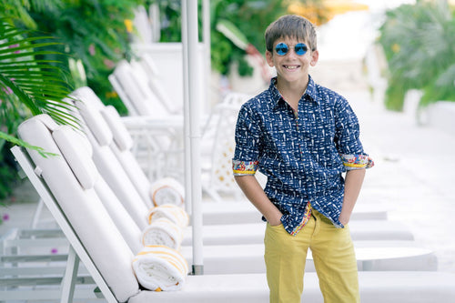 TukTuk Designs boys long sleeve nautical shirt in blue with white fish and contrasting collar, cuff and placket trims.