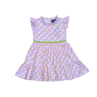 Pink dress with puppy pattern on a white background