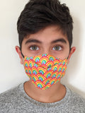 TukTuk Designs unique shaped 3D face masks in 100% cotton are created for maximum coverage and comfort. Stay safe and stylish in our bright rainbow print available in children and mommy and me sizes.