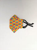 TukTuk Designs unique shaped 3D face masks in 100% cotton are created for maximum coverage and comfort. Stay safe and stylish in our bright rainbow print available in children and mommy and me sizes.