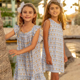 TukTuk Designs classic goldfish print in a breezy flutter sleeve dress is perfect for the summers. It is made with 100% soft viscose and perfect for twirling. Also available in matching sibling shirt.