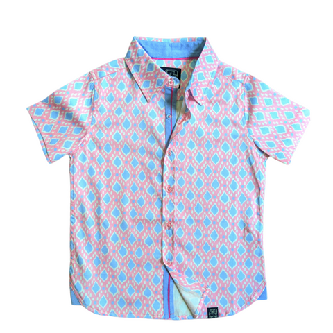 TukTuk Designs Ikat in Pink print is the perfect shirt for Easter brunch, vacations or any spring day. Made with 100% cotton and features details on the collar and placket. Also available to pair with matching sibling dresses and daddy and me shirt.