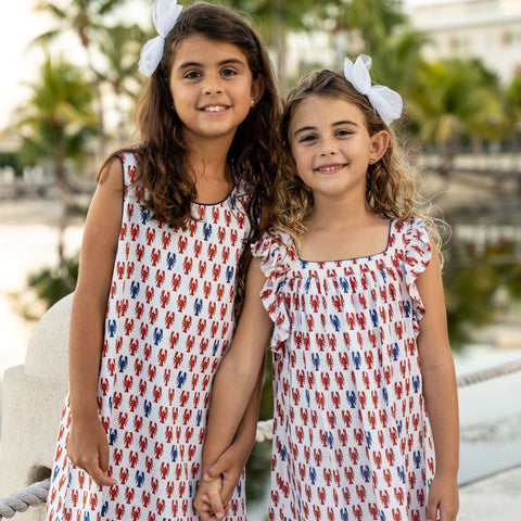 TukTuk Designs preppy Lobster breezy flutter sleeve dress perfect for the summers. Made with 100% viscose, lined with cotton and available in matching sibling sets of girls dresses and boys shirts
