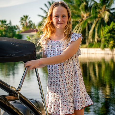 TukTuk Designs Anchors Aweigh flutter sleeve dress featuring anchors and sailboats in a soft viscose twirl worthy dress. Perfect for a summer day on the water. Available in matching sibling shirt!