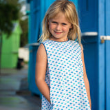 TukTuk Designs girls nautical origami sailboat shift dress with blue and green delicate sailboats, blue trim and side pockets. Available matching boys, sibling shirt 