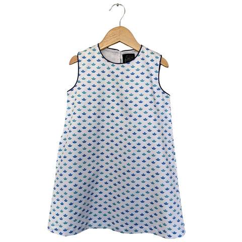 TukTuk Designs girls nautical origami sailboat shift dress with blue and green delicate sailboats, blue trim and side pockets. Available matching boys, sibling shirt .