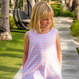 Preppy pink Ikat print shift dress in 100% cotton. Perfect for spring and available in matching sibling shirt and daddy and me shirt.