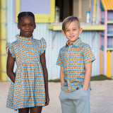 TukTuk Designs matching sibling dress and shirt in pumpkin pies print
