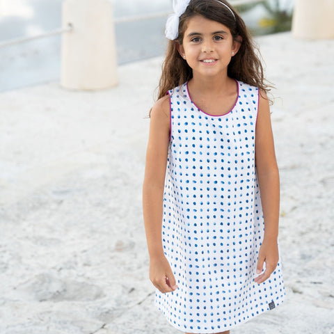 Beautiful watercolor dot print shift dress with contrast trim details. Our take on a classic, this is a summer staple. Available in matching sibling shirt and daddy and me shirt.