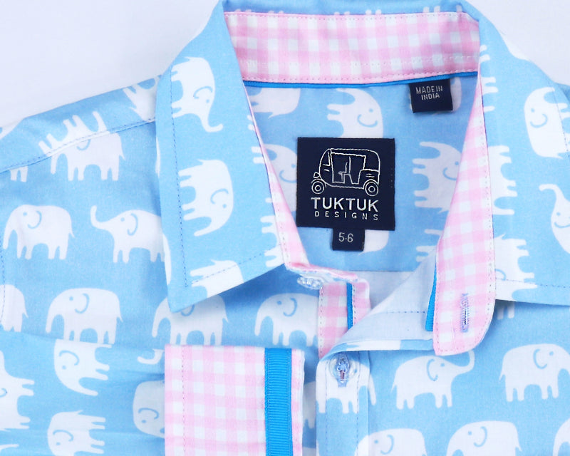 TukTuk Designs Boys long sleeve tailored shirts in blue elephant print with contrast pink gingham trim. Perfect for beach vacations, resorts and easter.