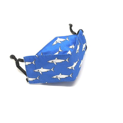 TukTuk Designs unique shaped 3D face masks in 100% cotton are created for maximum coverage and comfort. Stay safe and stylish in the Blue Mako Shark print available in children and mommy and me sizes.