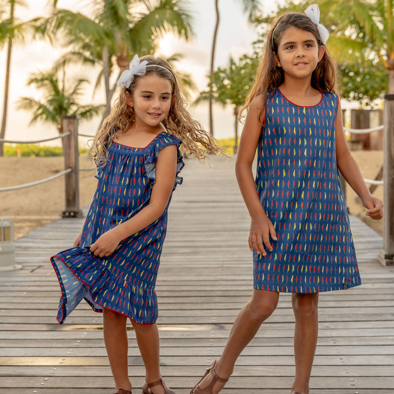 TukTuk Designs chilli peppers dress for a fun way to heat things up! Available in matching sibling shirt.